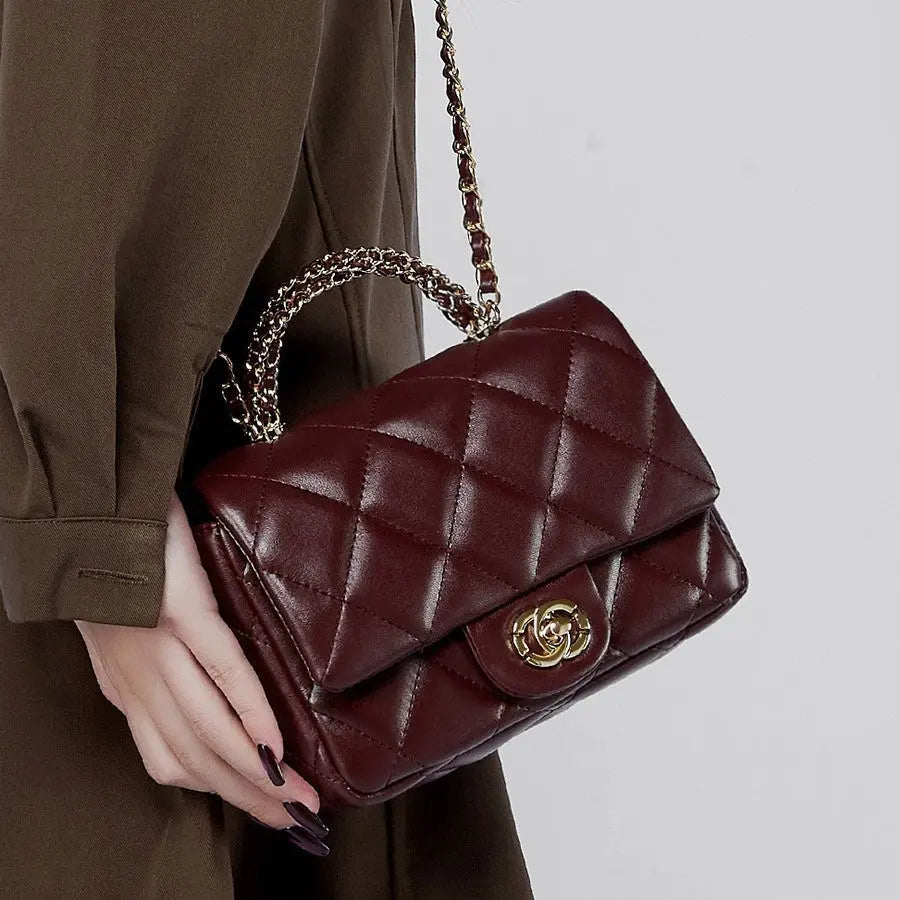Metal chain diamond grid handbag eprolo