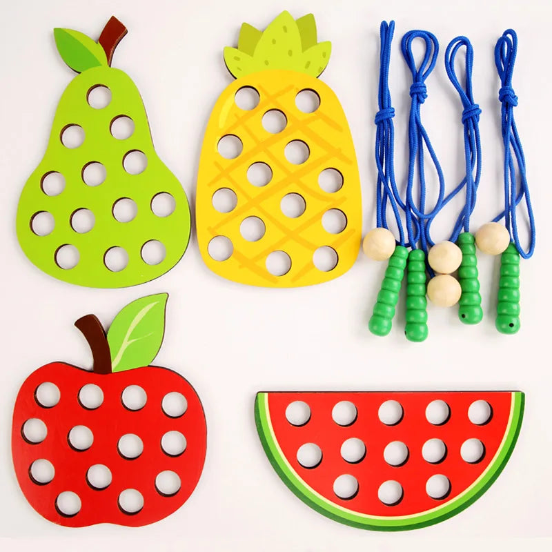 Wooden fruit threading board placed in Montessori early education threading game