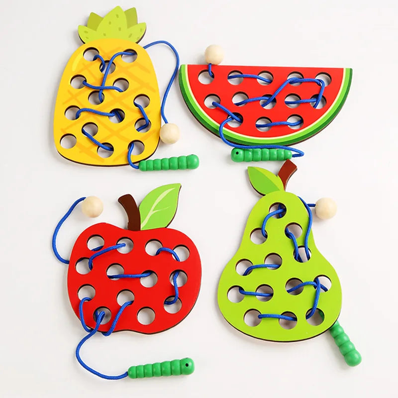 Wooden fruit threading board placed in Montessori early education threading game